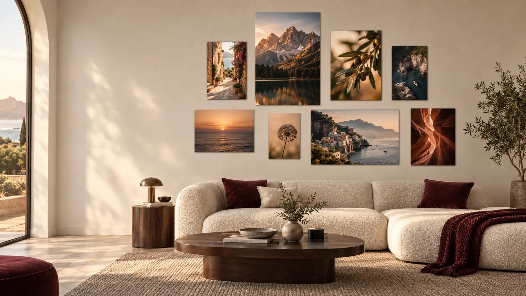 PlaqD metal poster gallery arranged above a sofa in a sunlit living room